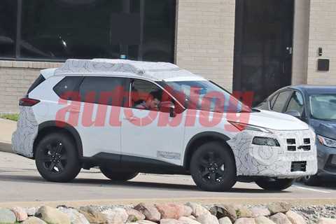 Nissan Rogue Rock Creek variant with chunky tires, roof rack caught in spy photos