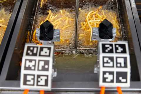 Robots are taking over fast-food kitchens. See how chains are using automation to make chips,..