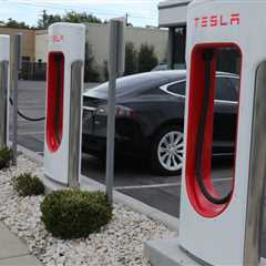 Tesla's EV charging team layoffs threaten to slow Biden's program to electrify highways