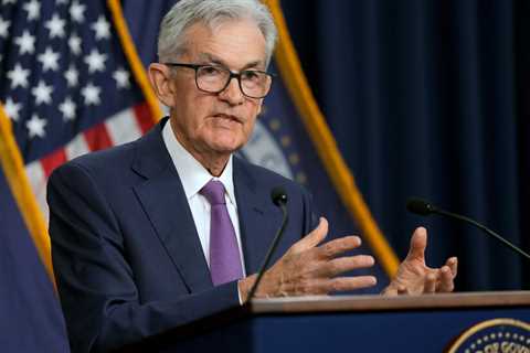 Fed Holds Rates Steady, Noting Lack of Progress on Inflation