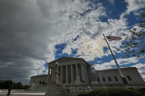Justices pause order to reinstate fired federal employees
